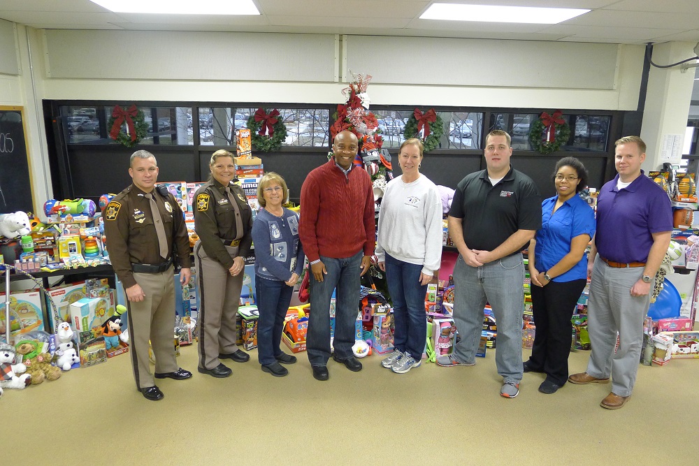 Corrections donates toys to Children's Aid Society