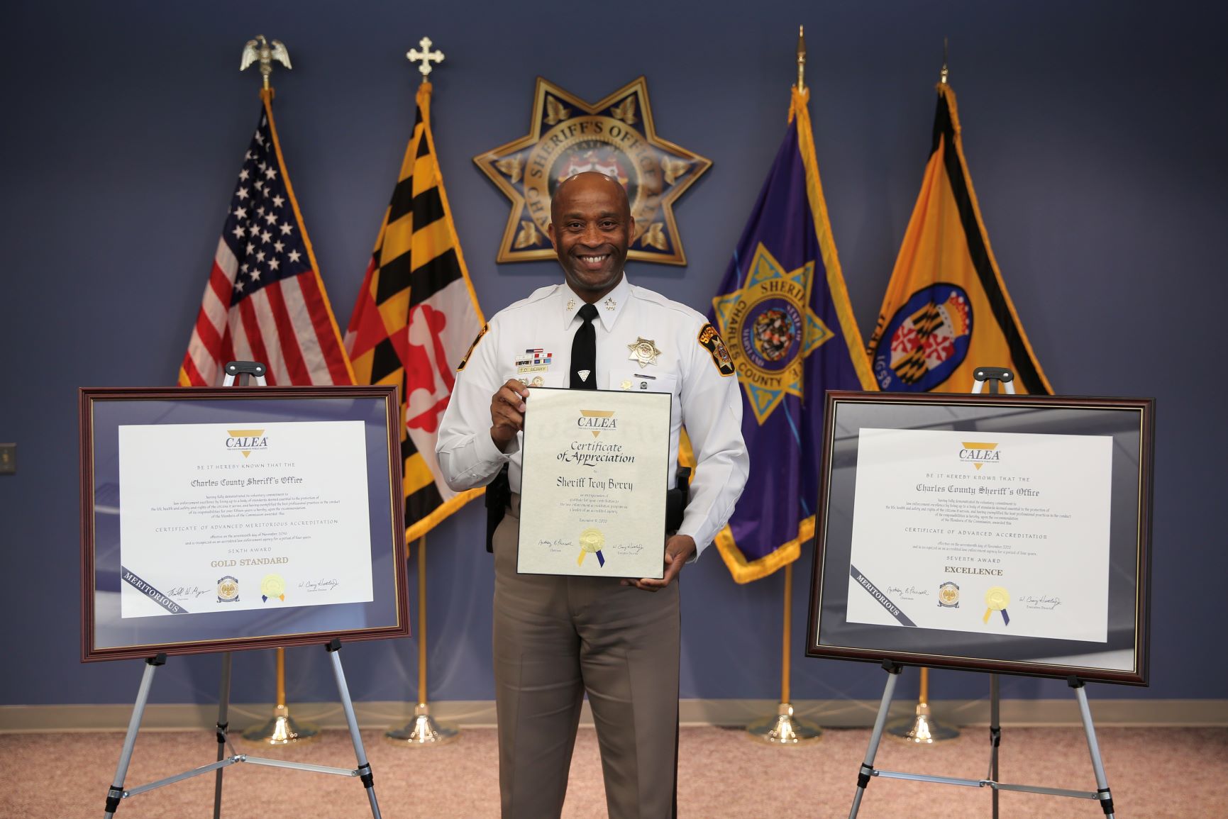 Sheriff-Troy-D.-Berry-with-Award-of-Excellence-from-CALEA-.jpeg