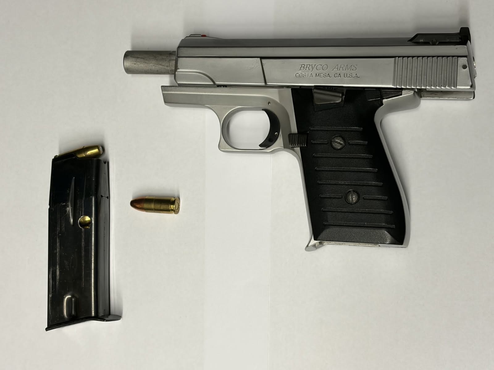 handgun with full magazine and one bullet